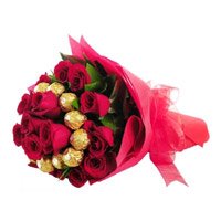 Send Online Rakhi with Chocolate, Red Roses Gift hamper to India