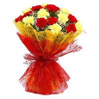 Rakhi with Red Yellow Carnation Flower Bouquet delivery in India
