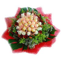 Send Rakhi Gift hamper 16 Pcs Ferrero Rocher and 24 Red White Roses Bouquet for Brother