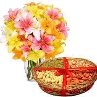 Four Rakhis with Lily Flowers and Mix Dry Fruits Rakhi Gift hamper online