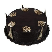 Rakhi with Eggless Chocolate Truffle Cake Delivery in India 5 Star Hotel