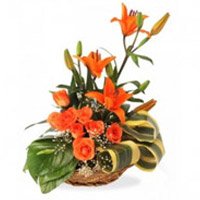 Send 3 Orange Lily 6 Orange Roses Basket 12 Flowers with Rakhi
