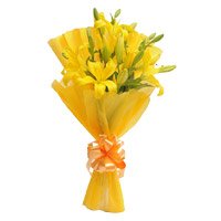 Yellow Lily Flower and Rakhi