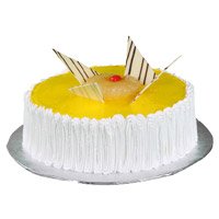 Online Rakhi Gifts to India Pineapple Cake with Rakhi