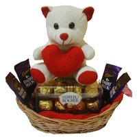 Deliver 4 Dairy Milk 16 Ferrero Rocher Chocolates with Rakhi to India and 6 Inch Teddy Basket