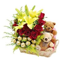 Rakhi Gifts Online to India 2 Lily 12 Roses 16 Ferrero Rocher Twin Small Teddy Basket